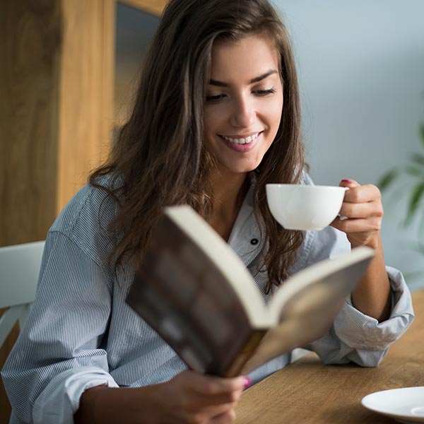 women reading with coffee